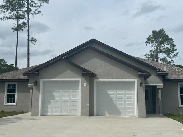 15 Regina Ln in Palm Coast, FL - Building Photo