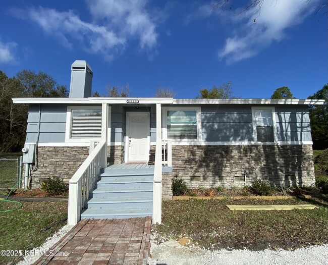 property at 8515 Maple St