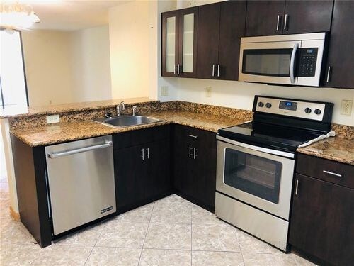 10131 W Sunrise Blvd-Unit -2J1 in Plantation, FL - Building Photo