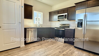 5102 E Norma Ave in Post Falls, ID - Building Photo - Building Photo