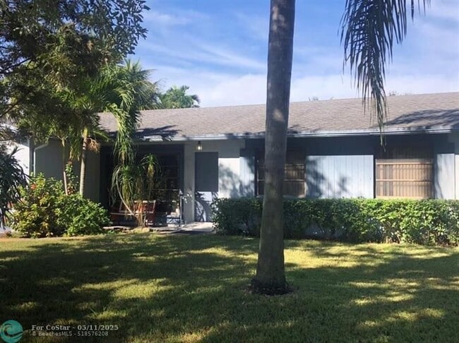 property at 8431 NW 3rd St