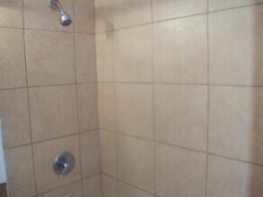 206 College Ave, Unit PennWell in Oskaloosa, IA - Foto de edificio - Building Photo