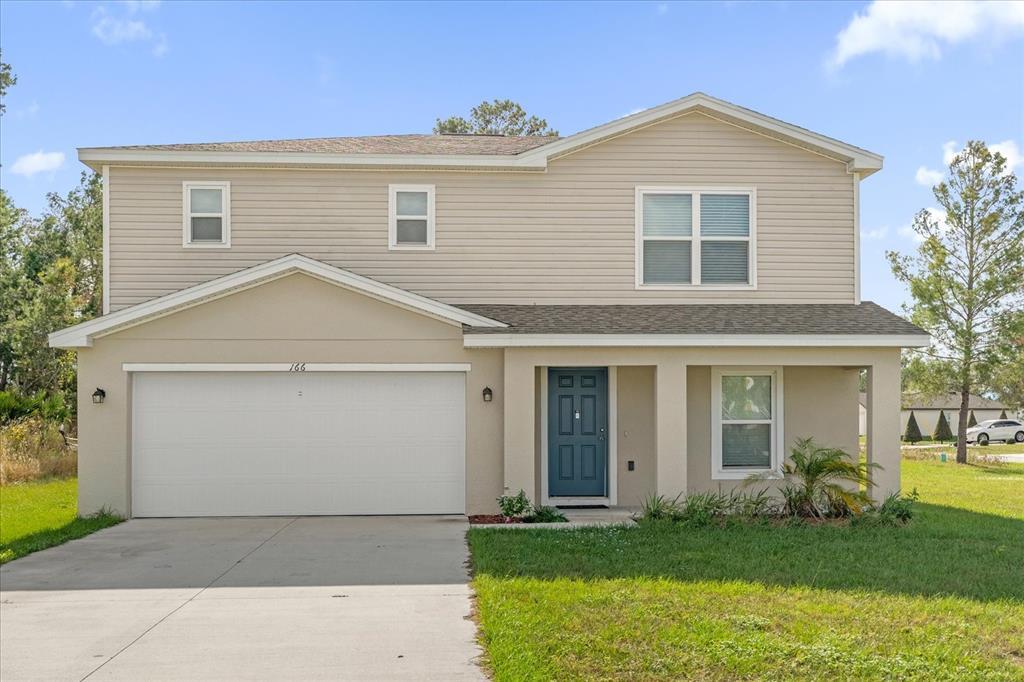 166 Maple Dr in Poinciana, FL - Building Photo