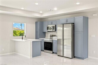 917 Hepburn Ave, Unit 09 in Lehigh Acres, FL - Building Photo - Building Photo