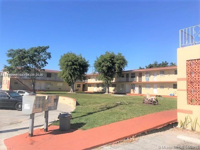 property at 2441 NW 13th St