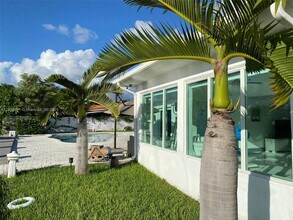 12388 N Bayshore Dr in North Miami, FL - Building Photo - Building Photo