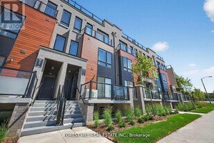 165 Tapscott Rd in Toronto, ON - Building Photo