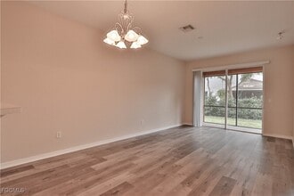 10231 Tin Maple Dr in Estero, FL - Building Photo - Building Photo