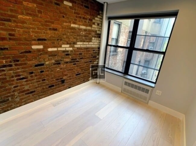 STANTON ST., Unit 6G in New York, NY - Foto de edificio - Building Photo