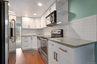 1885 S Quebec Way, Unit H27 in Denver, CO - Foto de edificio - Building Photo