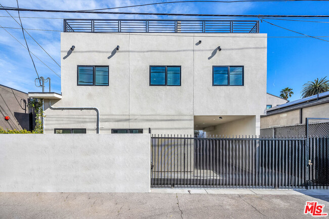 1055 Palms Blvd in Los Angeles, CA - Building Photo - Building Photo