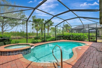 13558 San Georgio Dr in Estero, FL - Building Photo - Building Photo