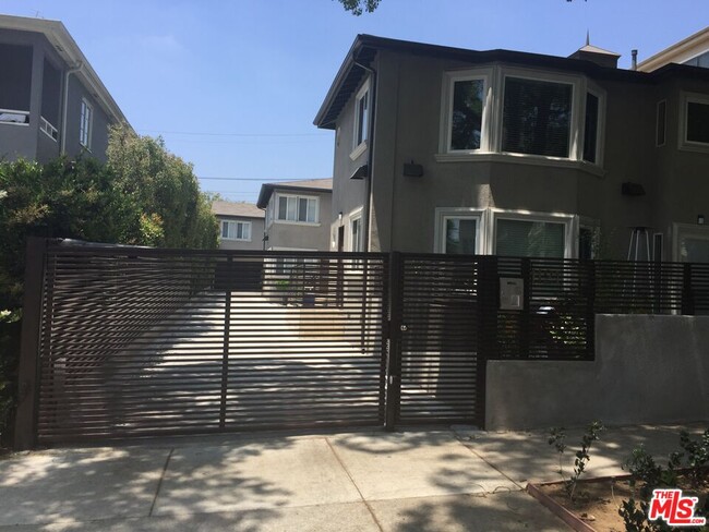 property at 1121 N Sweetzer Ave