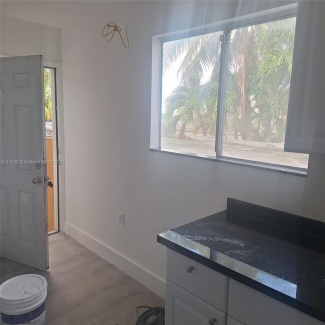 property at 4335 NW S Tamiami Canal Dr