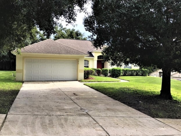 1430 Windy Bluff Dr in Minneola, FL - Building Photo