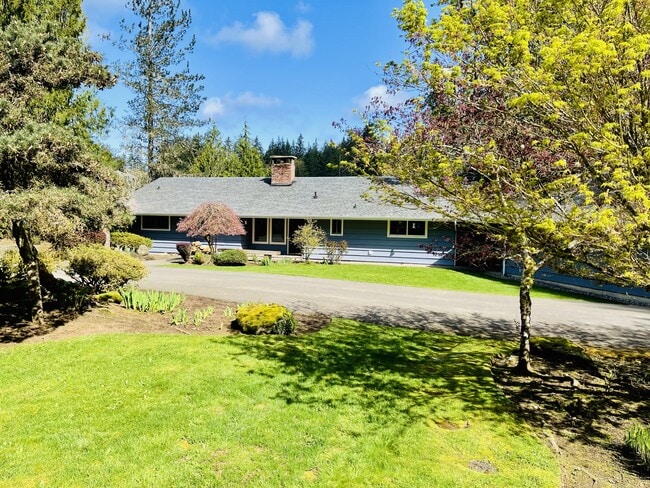 property at 3211 SE Kamilche Point Rd