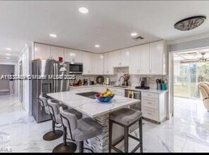 3954 Coconut Cir N in Naples, FL - Building Photo - Building Photo