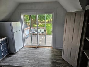 295 5th St, Unit Upper in Manistee, MI - Building Photo - Building Photo