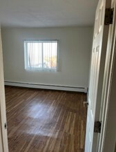 31 Iroquois St, Unit 12L in Boston, MA - Foto de edificio - Building Photo