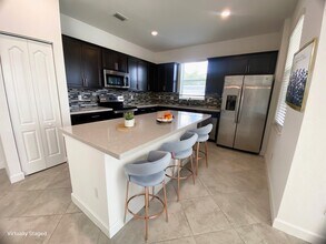 7879 NW Greenbank Cir in Port St. Lucie, FL - Building Photo - Building Photo