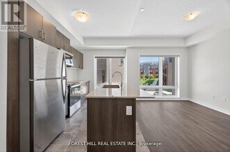 165 Tapscott Rd in Toronto, ON - Building Photo - Building Photo