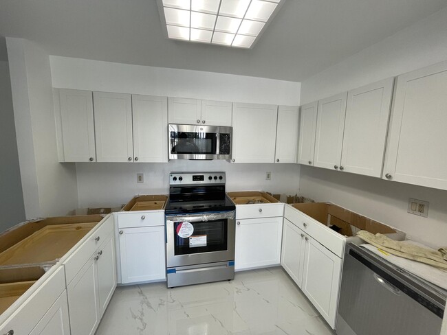12124 Regal Ct N in Wellington, FL - Building Photo - Building Photo