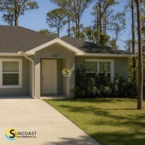 12007 Henley Ave in Port Charlotte, FL - Building Photo