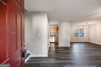 380 River Trace Dr, Unit Adults and children in Villa Rica, GA - Building Photo - Building Photo