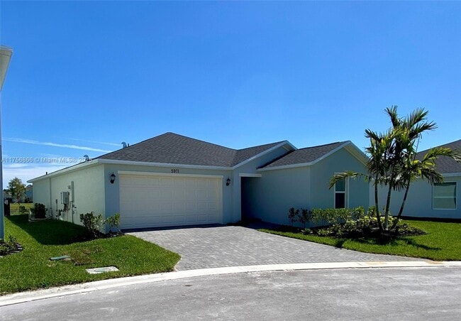 5971 Pickering Dr in Port St. Lucie, FL - Foto de edificio - Building Photo