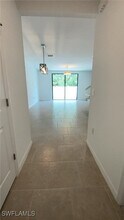 14195 Oviedo Pl in Tice, FL - Building Photo - Building Photo