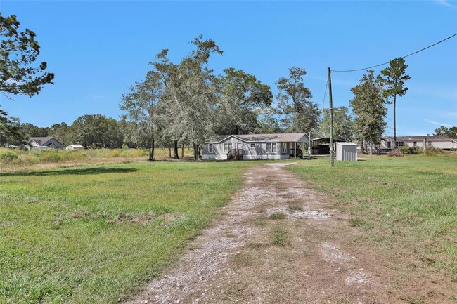 12180 Rebel Rd in Cleveland, TX - Building Photo - Building Photo