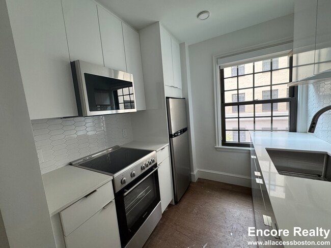 1172 Massachusetts Ave, Unit 409A in Cambridge, MA - Building Photo - Building Photo