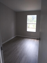 13295 Commonwealth Ave N in Polk City, FL - Building Photo - Building Photo