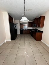 3909 Flowering Orchid Ln in Kissimmee, FL - Foto de edificio - Building Photo