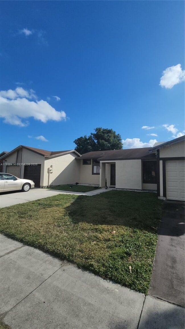 property at 9660 W Elm Ln