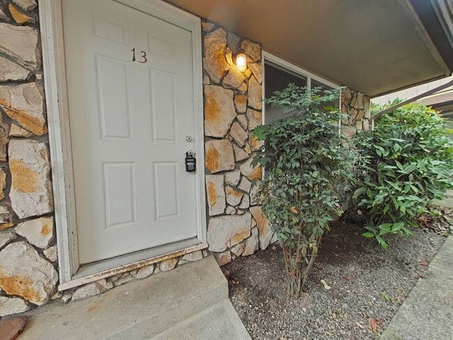 property at 114 NE Conifer Blvd