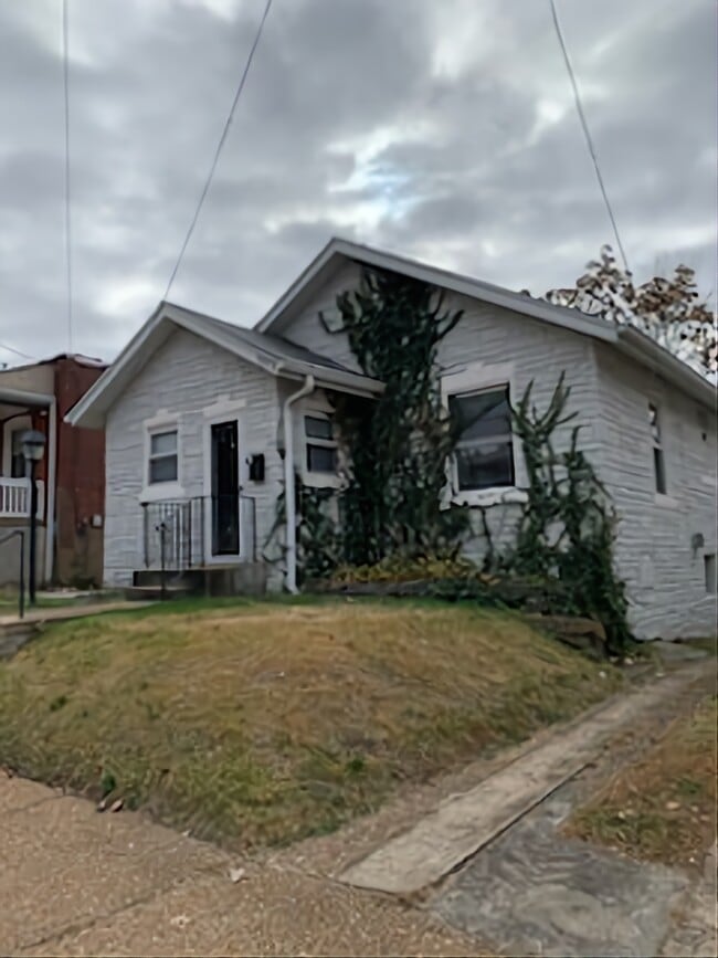 property at 7022 Plateau Ave