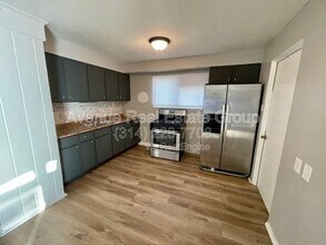 8330 Woodhurst Dr in Berkeley, MO - Building Photo - Building Photo