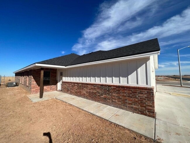 1407 17th St, Unit A in Shallowater, TX - Foto de edificio - Building Photo