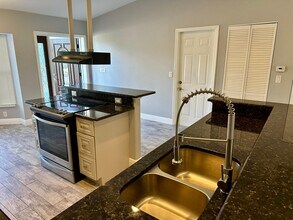 473 Flamingo Blvd, Unit A in Port Charlotte, FL - Foto de edificio - Building Photo