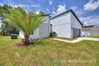 131 Barrington Dr in Poinciana, FL - Foto de edificio - Building Photo