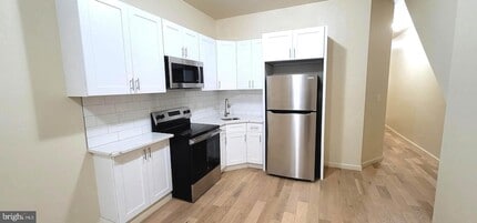 1219 W Silver St, Unit 1 in Philadelphia, PA - Foto de edificio - Building Photo