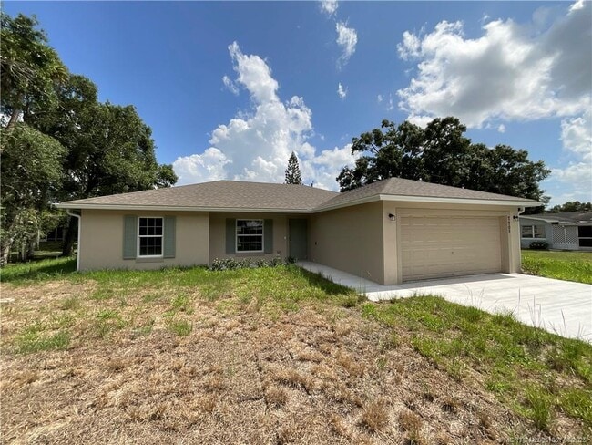 property at 7702 Lakeland Blvd