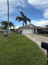 4025 SW 14th Pl in Cape Coral, FL - Building Photo - Building Photo