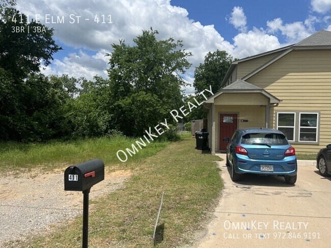property at 411 E Elm St