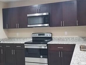 8495 Dinnano St in Port Charlotte, FL - Building Photo - Building Photo