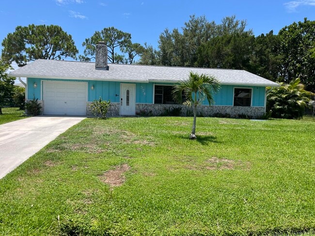 property at 574 SW Duval Ave
