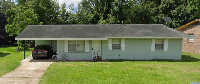 property at 311 Vernon Dahmer Dr