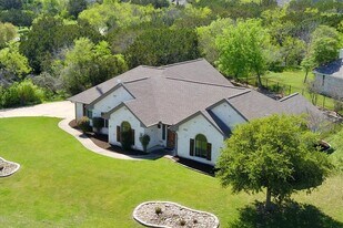 239 Cove Creek Dr in Spicewood, TX - Building Photo