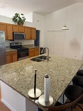 1013 SW London Ln in Port St. Lucie, FL - Building Photo - Building Photo